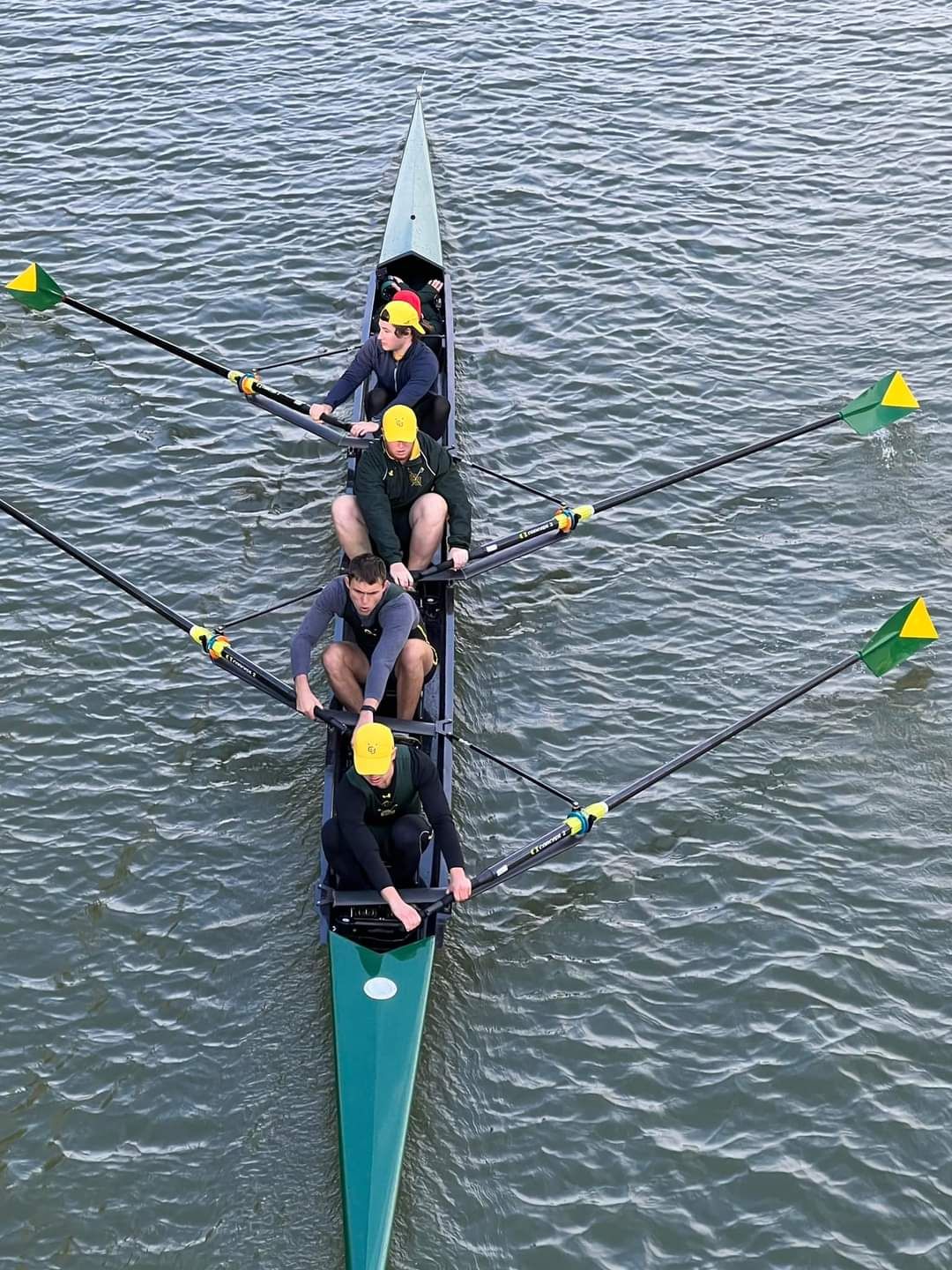 Four-person rowing shell seen from directly above